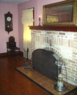 As you enter the front door, this cozy vintage fireplace catches the eye immediately. It is furnished with other vintage items such as the cathedral fire screen, illuminated electric smoker stand. This room has very comfortable sitting areas and is large enough to accommodate and extra person if necessary.