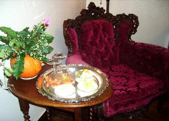 The cozy corner of the Guest Room. Enjoy sitting in our vintage Rococo chair with a glass of wine and hors d'oeuvre